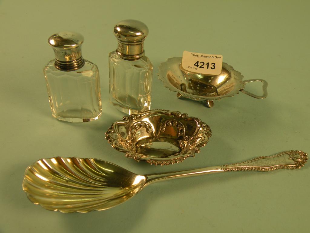 Appraisal: A silver spoon with a shell shaped bowl two silver