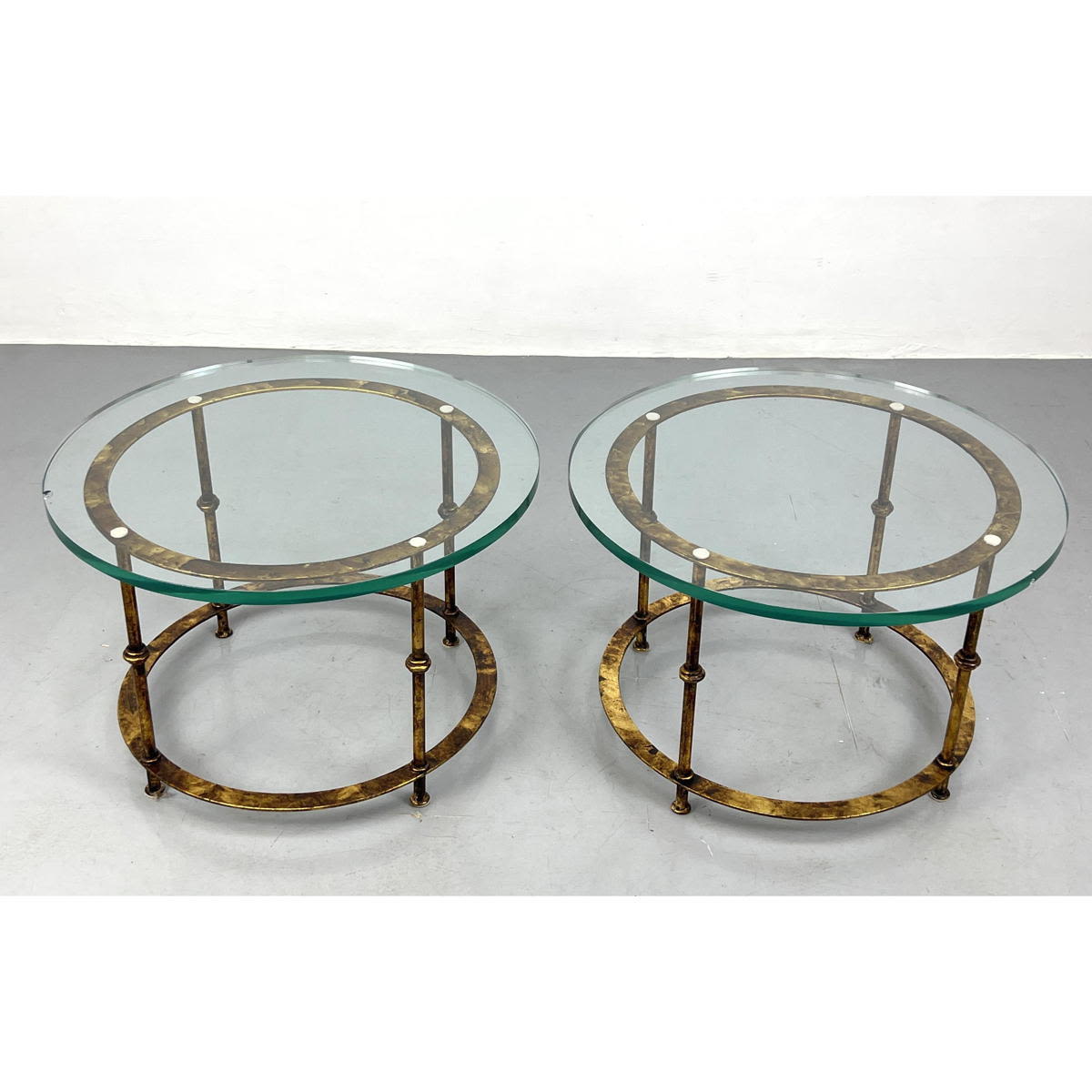 Appraisal: Pair Italian Gilt Metal Side Tables Thick glass Tops Dimensions