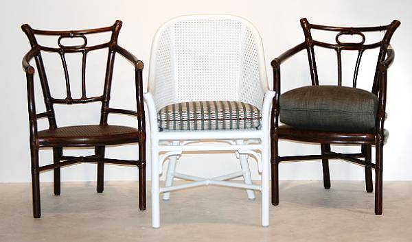 Appraisal: Two similar rattan 'Delfino' armchairs together with caned armchair McGuire