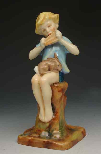 Appraisal: A ROYAL WORCESTER PORCELAIN MODEL 'Peter Pan' modelled by F