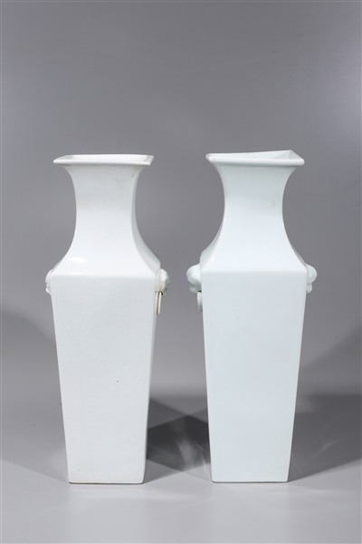 Appraisal: Pair of Chinese square form white porcelain vases with mask