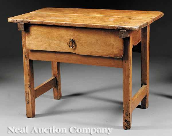 Appraisal: An Antique Continental Walnut Side Table a rough-hewn two board