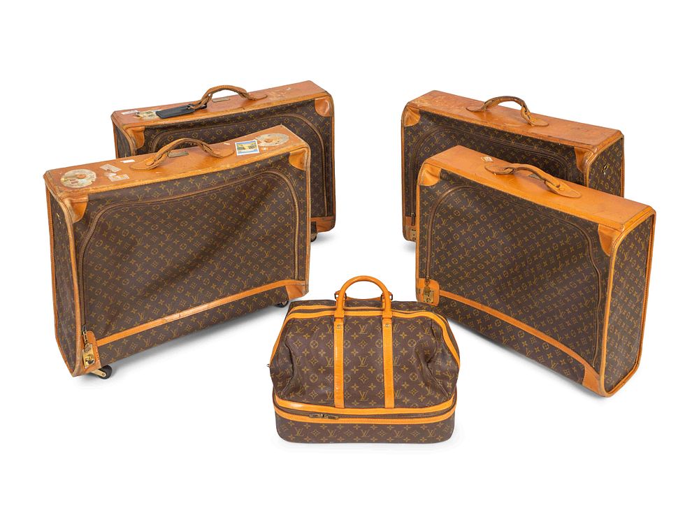 Appraisal: Five Louis Vuitton Suitcases Dimensions Garment bags x x inches