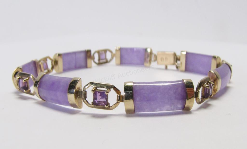 Appraisal: A K yellow gold accented purple jadeite Amethyst Bracelet