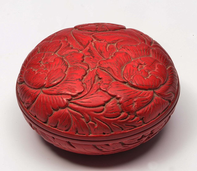 Appraisal: A JAPANESE RED LACQUER KOGO of domed circular form carved