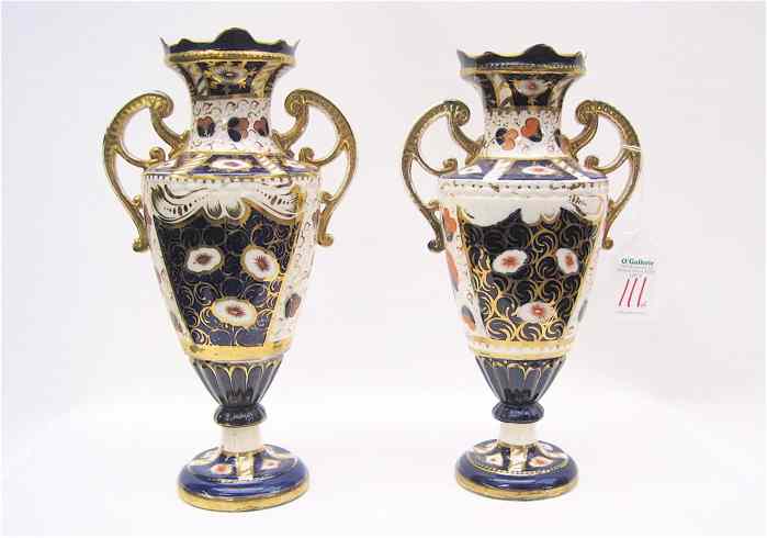 Appraisal: PAIR ENGLISH PORCELAIN URNS Imari pattern with blue orange and