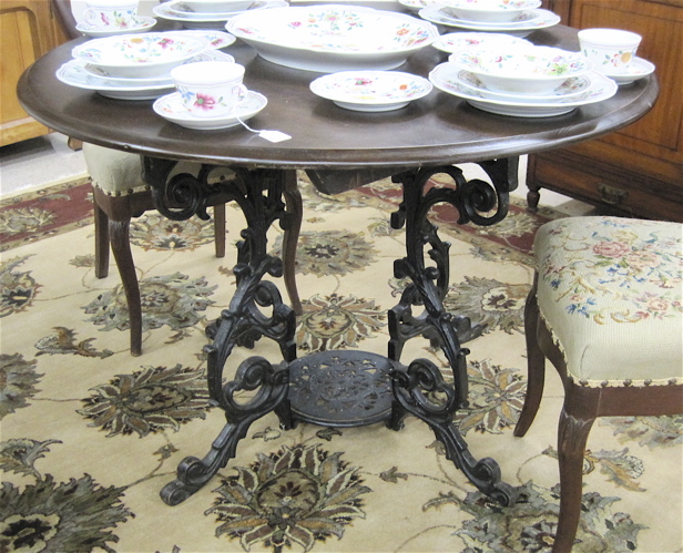 Appraisal: WALNUT AND CAST IRON PUB TABLE English early th century