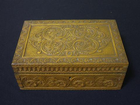 Appraisal: CONTINENTAL CARVED WOOD BOX The glowing golden wood possibly stainwood