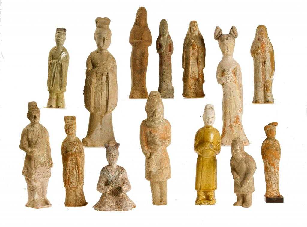 Appraisal: FOURTEEN EARTHENWARE TOMB FIGURES TANG DYNASTY including one of a