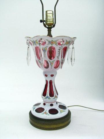 Appraisal: Bohemian Cased Glass Ruby Lamp with enamel floral decoration and