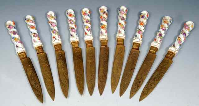 Appraisal: A SET OF TEN CONTINENTAL PROBABLY GERMAN PORCELAIN TEA KNIVES