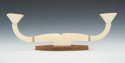 Appraisal: A Wood and Ivory Candleholder A modernist style double candle