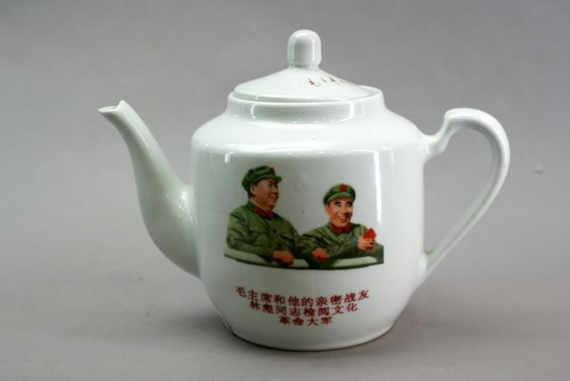 Appraisal: A Chinese porcelain teapot and cover decorated with transferred images