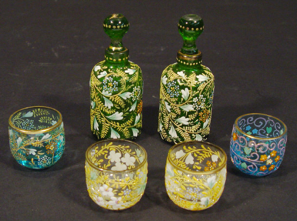 Appraisal: Pair of Victorian green glass scent bottles profusely enamelled with