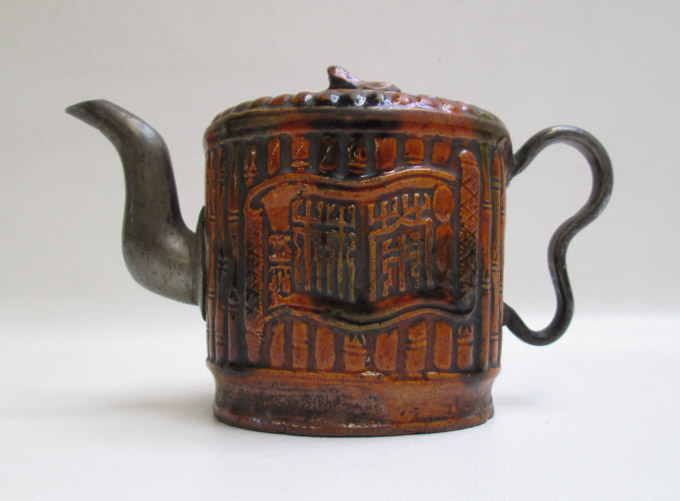 Appraisal: CHINESE POTTERY AND METAL TEAPOT Qing Dynasty having rust glaze