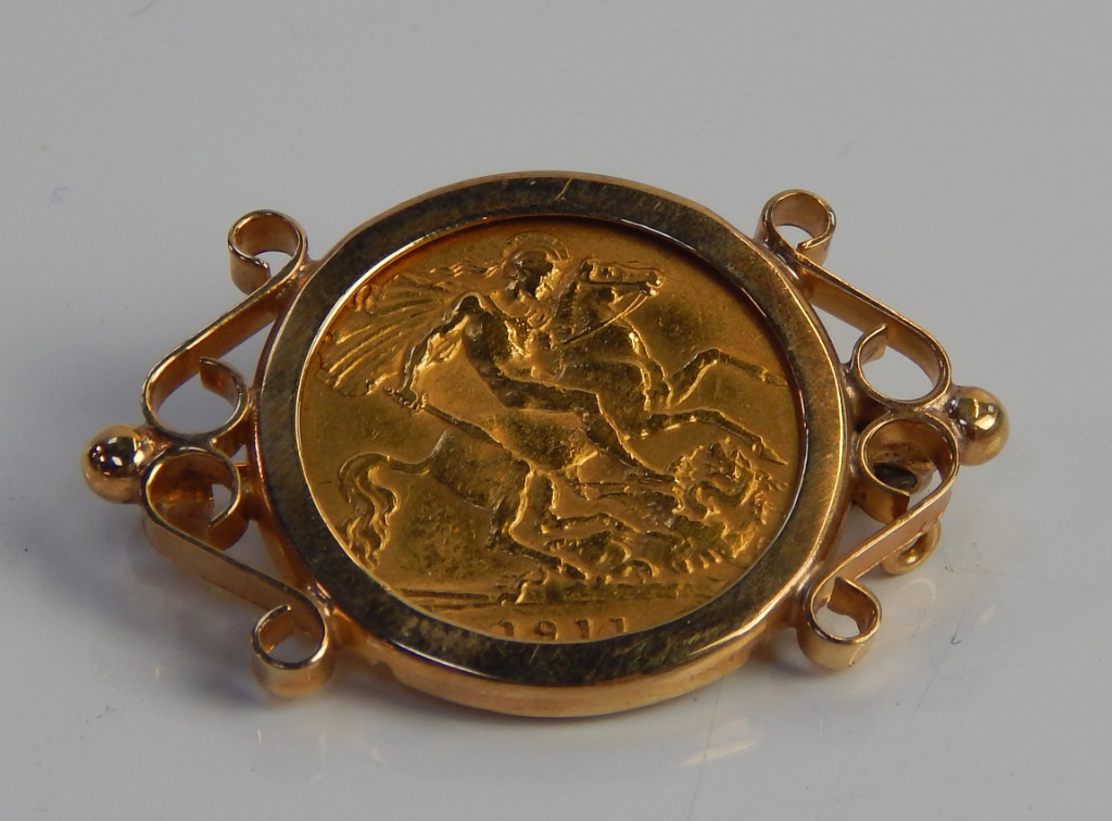 Appraisal: A George V half gold sovereign in ct gold frame