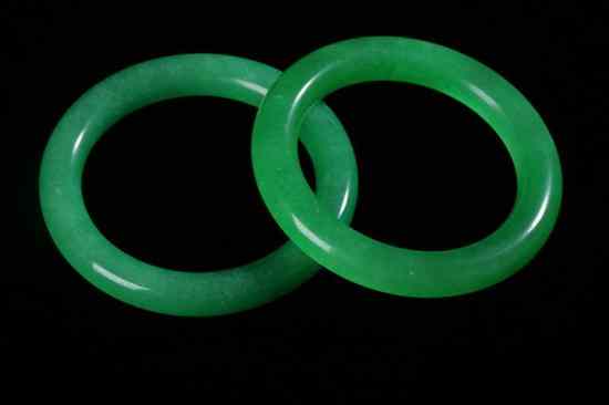 Appraisal: PAIR CHINESE EMERALD GREEN JADEITE BANGLE - in diam