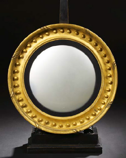 Appraisal: English Regency Carved and Parcel-Ebonized Giltwood Convex Looking Glass first