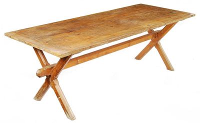 Appraisal: A Victorian pine tavern table the planked top with cleated