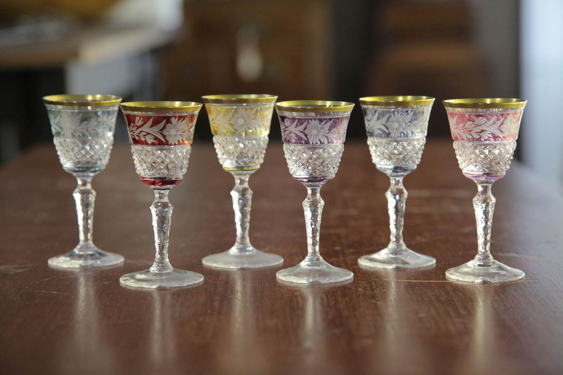 Appraisal: SIX CUT GLASS CORDIALS European th century Gilt rims with