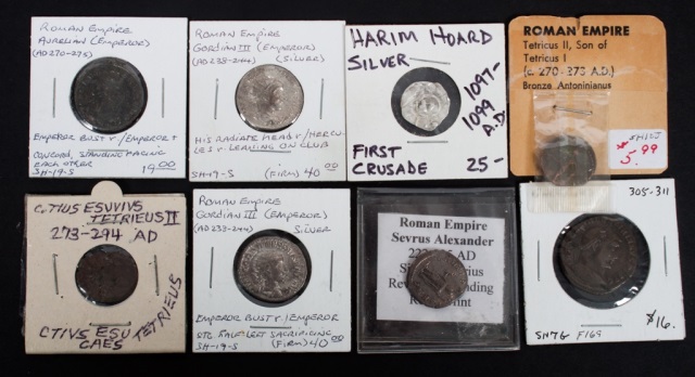 Appraisal: Seven ancient Roman coins and one medieval coin comprising silver