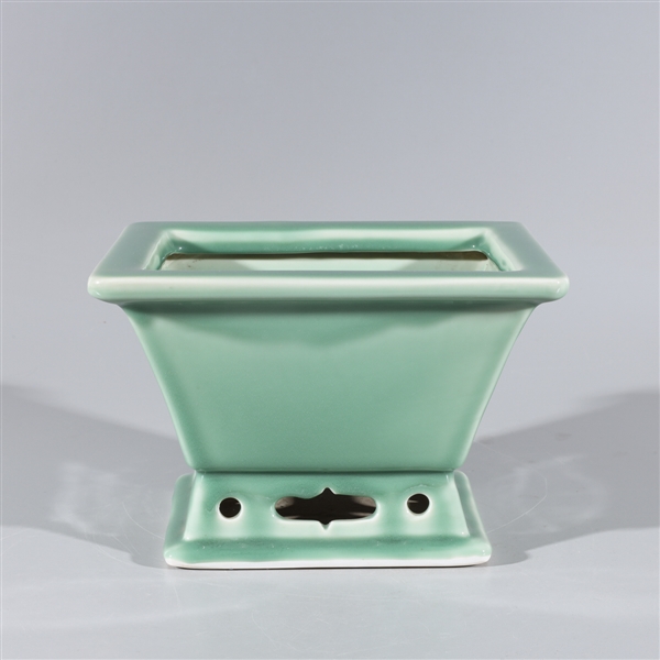 Appraisal: Chinese celadon glazed porcelain basin with molded base overall good