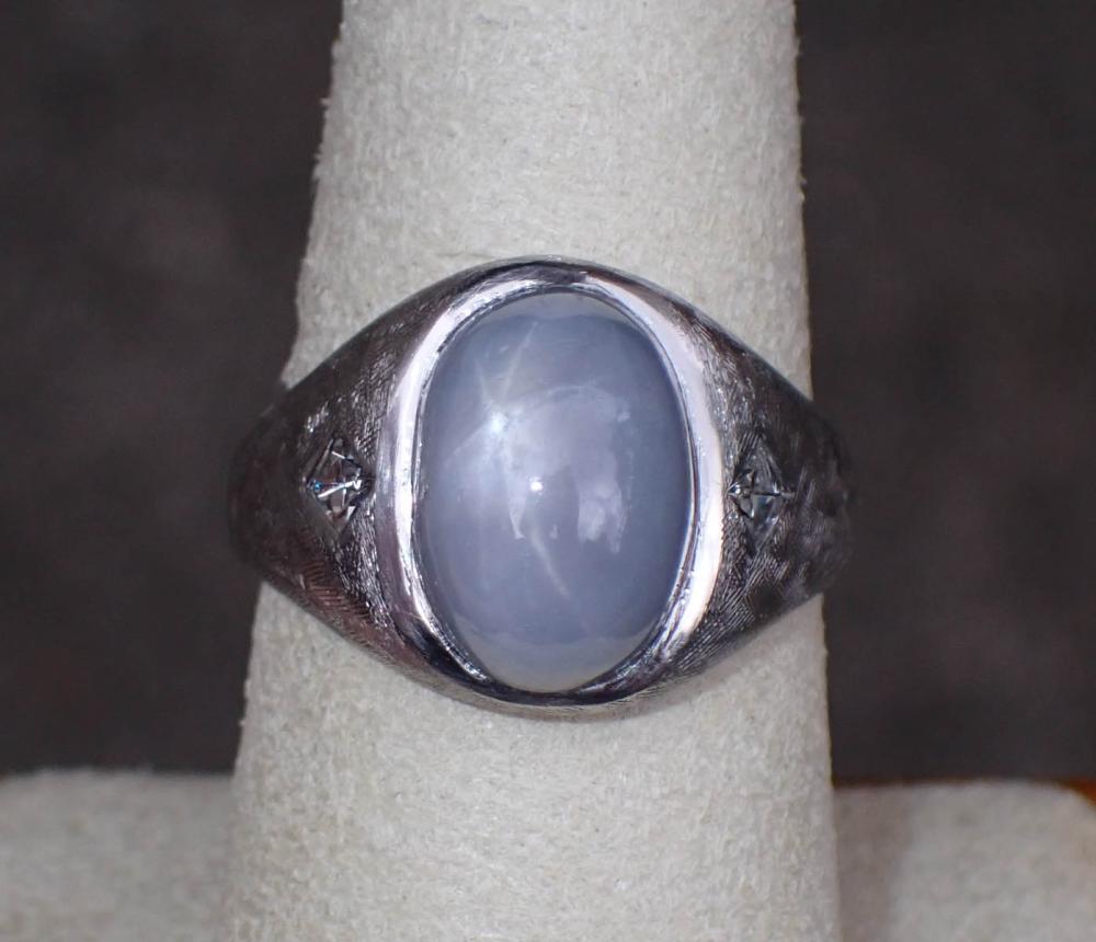 Appraisal: MAN'S STAR SAPPHIRE DIAMOND AND FOURTEEN KARAT GOLD RING The