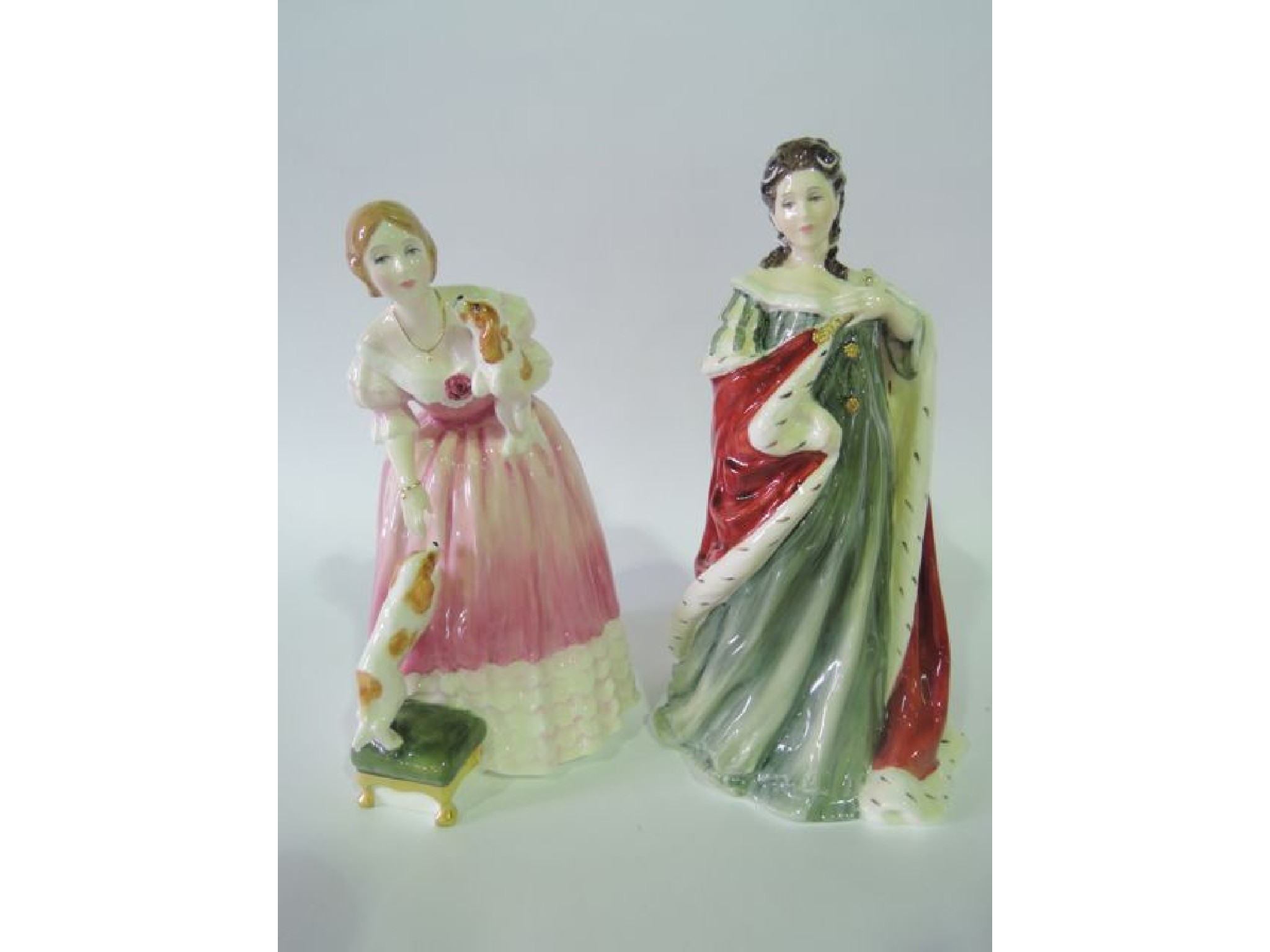 Appraisal: Two boxed Royal Doulton limited edition figures from the Queens