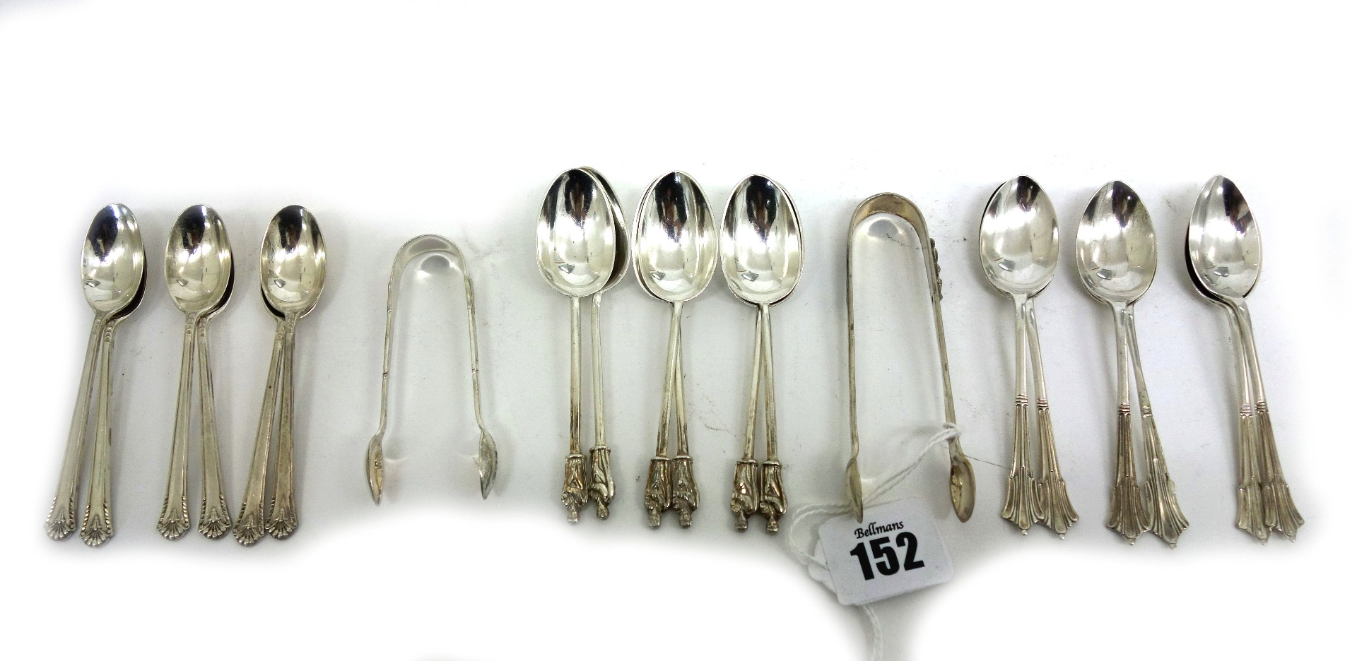 Appraisal: A set of six silver 'apostle' teaspoons and sugar tongs