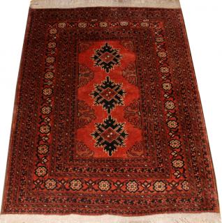 Appraisal: BOKHARA HAND WOVEN ORIENTAL RUG W L Rust color field