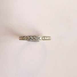 Appraisal: An ct gold diamond set band estimated total diamond weight