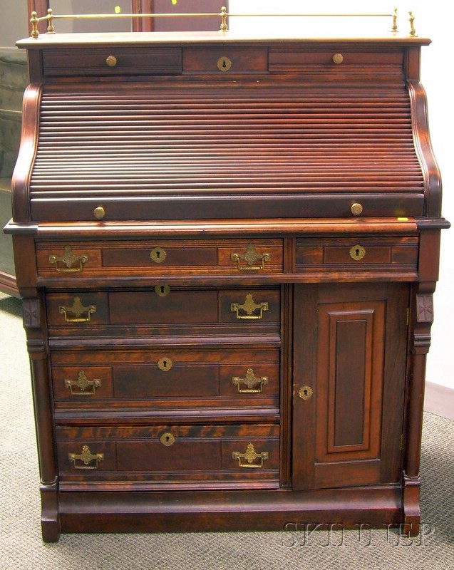 Appraisal: Diminutive Victorian Eastlake-type Brass-mounted Carved Cherry Roll-top Desk ht wd