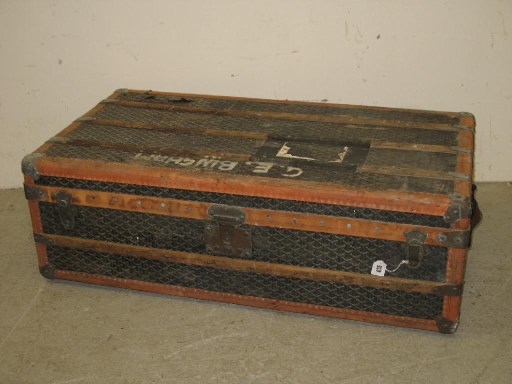 Appraisal: Malles Goyard Paris A travelling trunk with leather side handles