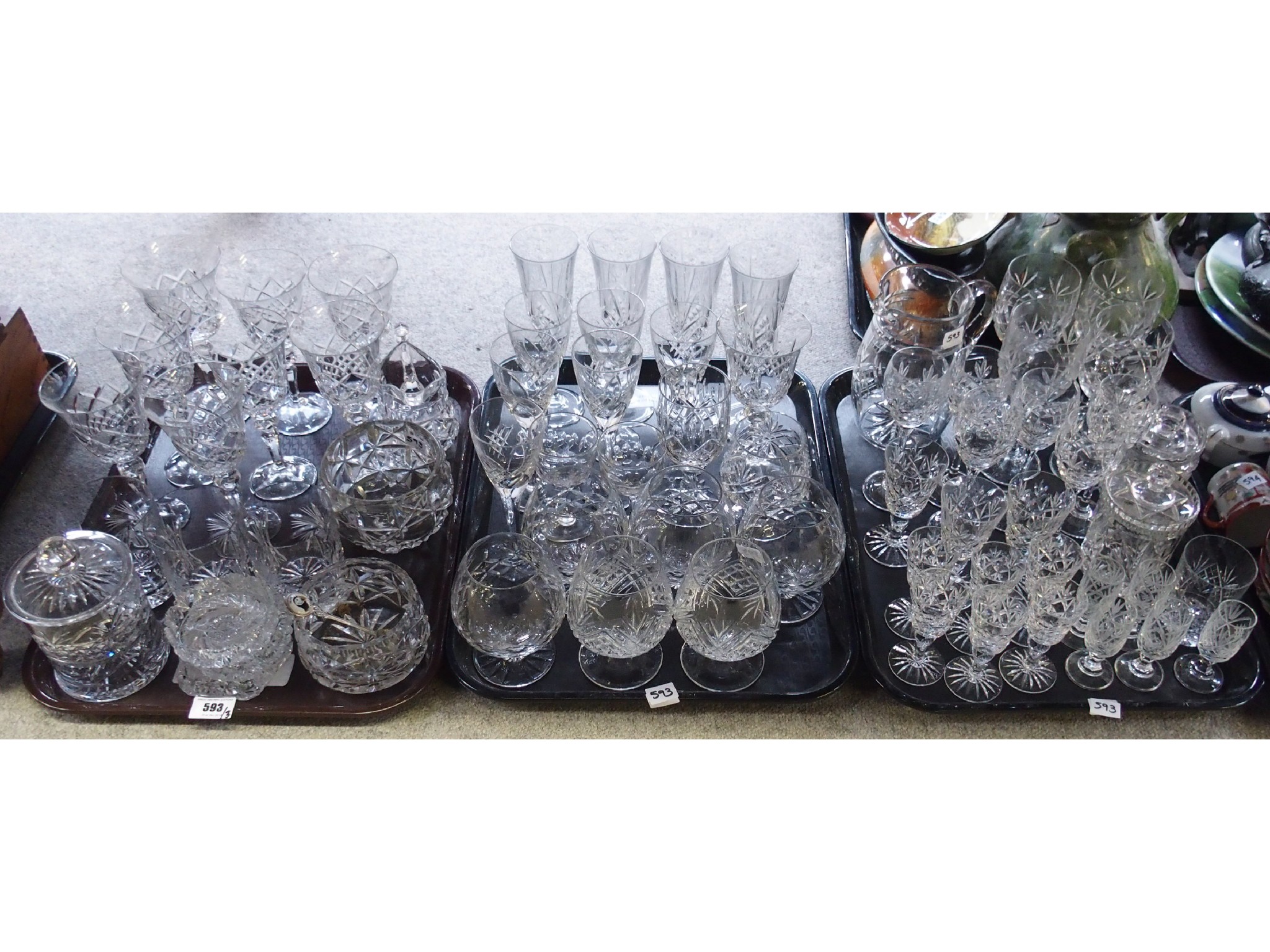 Appraisal: Three trays comprising various cut glass stemware including brandy snifters