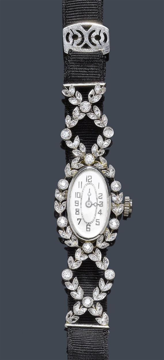 Appraisal: A LADY'S DIAMOND WRISTWATCH ESZEHA circa Platinum and white gold