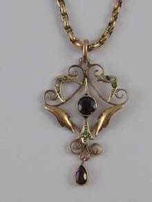 Appraisal: A yellow metal tests ct gold Art Nouveau pendant set