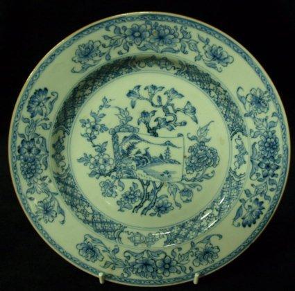 Appraisal: A th Century blue and white plate decorated chrysanthemums and