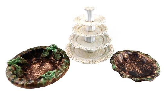 Appraisal: Three Continental ceramics four tier porcelain dessert stand graduating levels