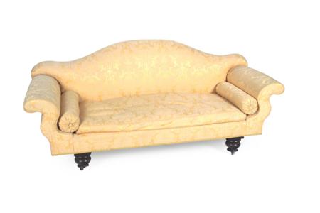 Appraisal: A th century sofa the camel back over S-shaped arms