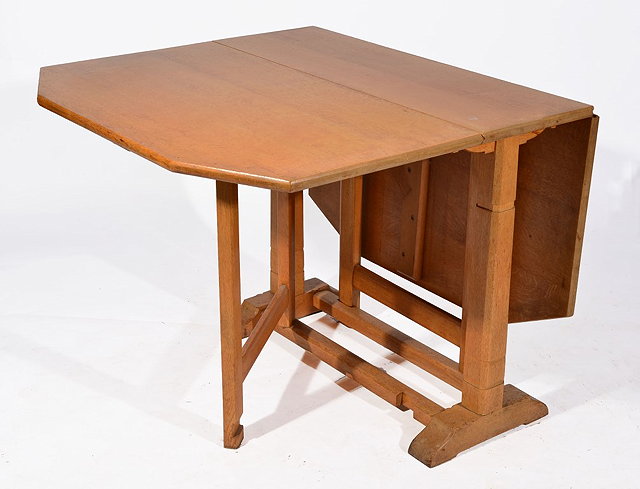 Appraisal: A HEALS LIGHT OAK GATELEG TABLE circa standing on chamfered