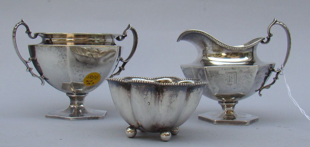 Appraisal: THREE PIECES OF STERLING SILVER HOLLOWWARE Pedestal creamer and sugar