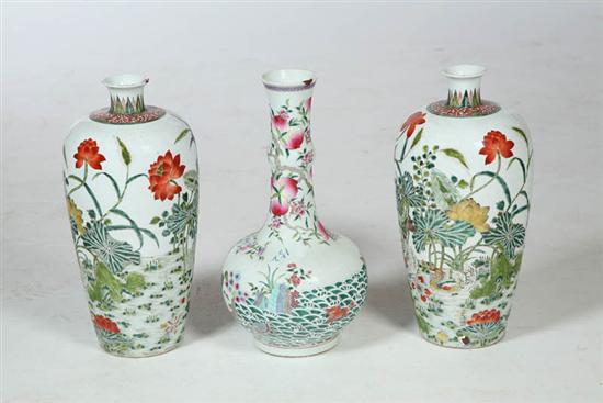 Appraisal: THREE VASES China th century porcelain Pair of Famille Rose