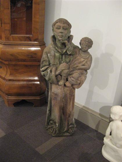 Appraisal: Carved sandstone figure of Saint Anthony and Christ H in