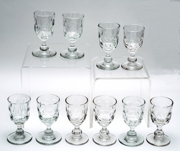 Appraisal: Set of ten blown clear glass wines thumbprint pattern with