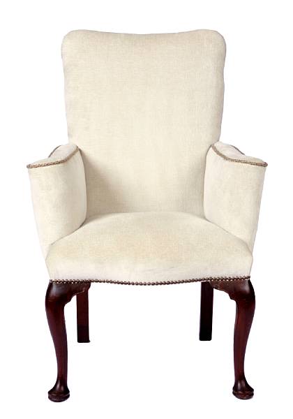 Appraisal: A pair of George III style armchairs with fully upholstered