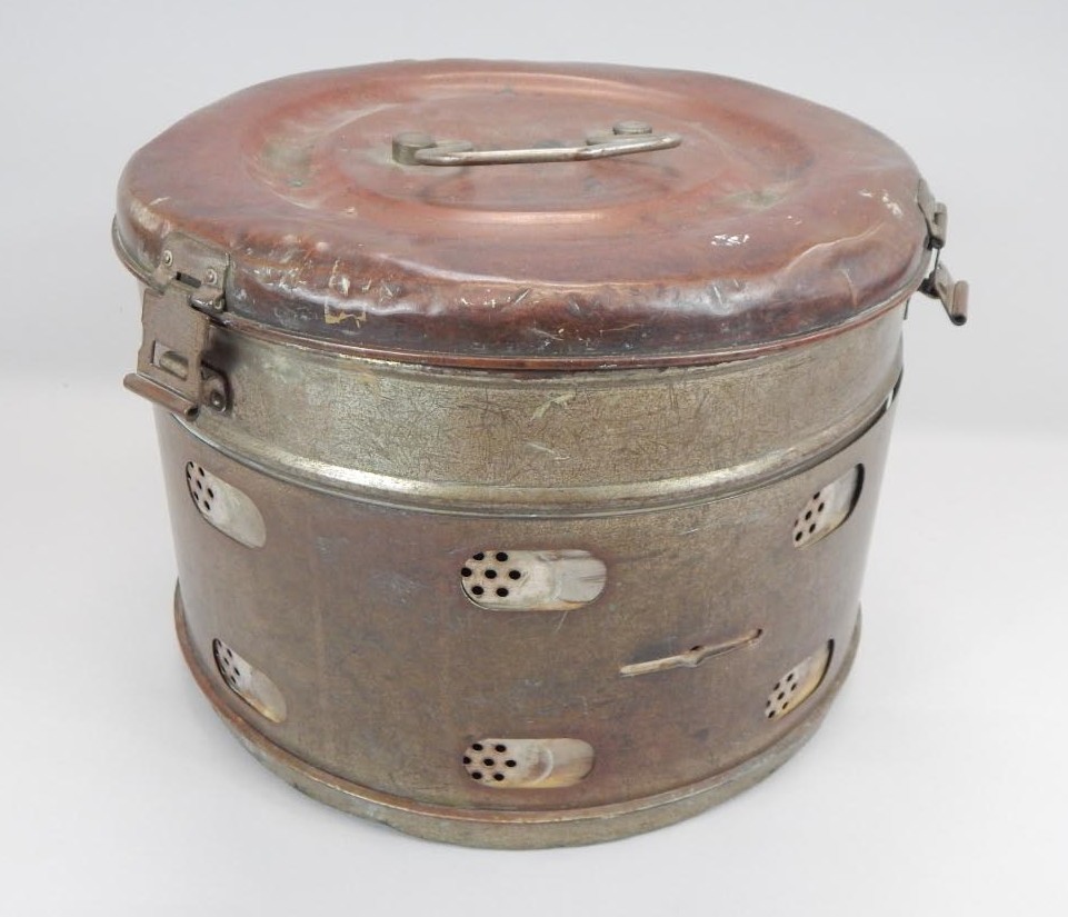 Appraisal: A copper and tin hat type box with perforated sides