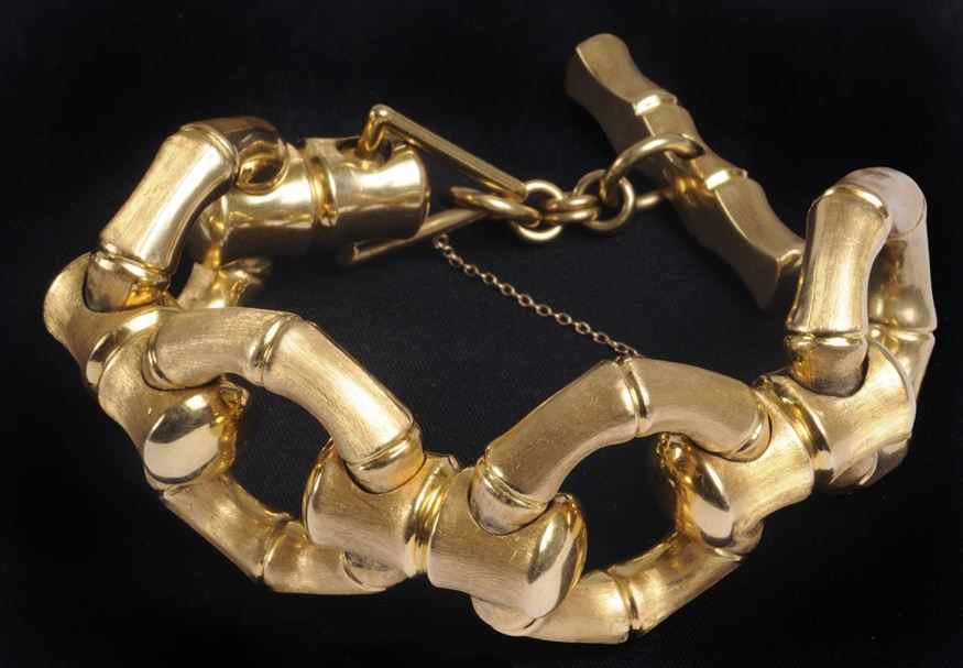 Appraisal: GOLD BAMBOO-FORM LINK BRACELET With three lozenge-shaped marks one stamped