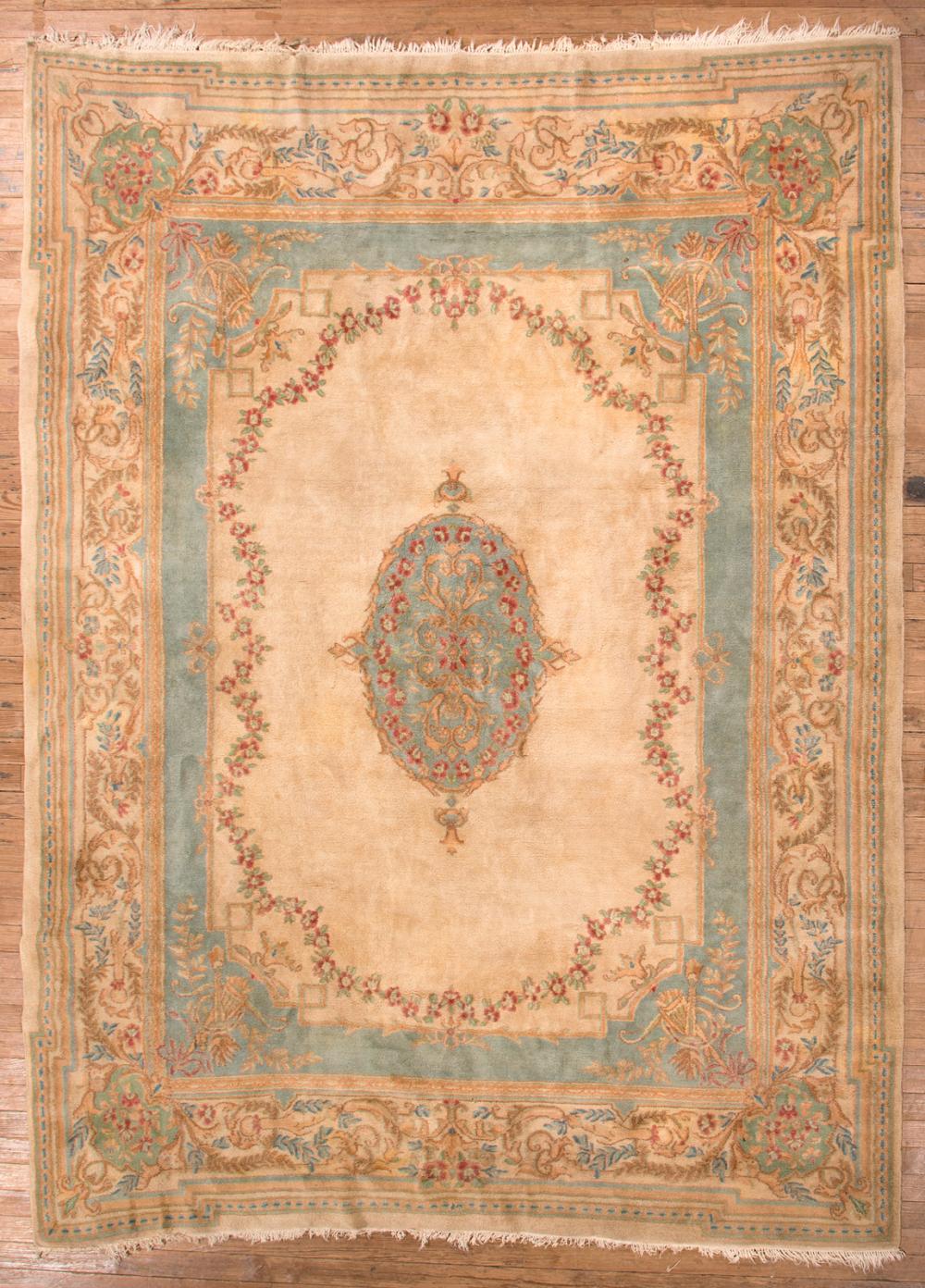 Appraisal: Aubusson-Style Carpet cream ground floral medallion and borders ft in