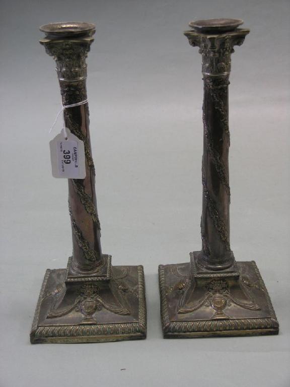 Appraisal: A pair of George III Old Sheffield Plate candlesticks Adam-style