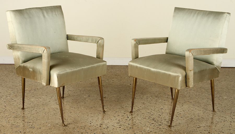 Appraisal: PAIR TAILORED ITALIAN OPEN ARM CHAIRS BRASS LEGS A pair